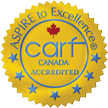 A gold seal showing the accreditation of CARF for Canadian Shield Health Services for their Aspire to Excellence.